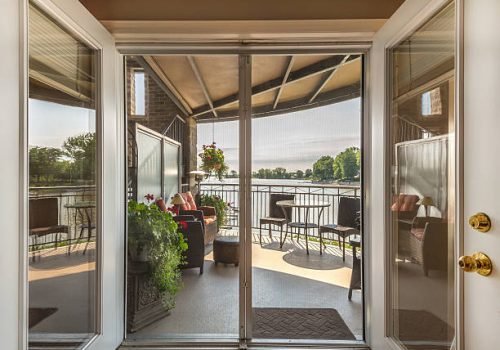 Inside view overlooking balcony and lake